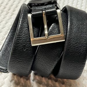 Black Leather Stretch Belt size 46/48 with silver tone hardware